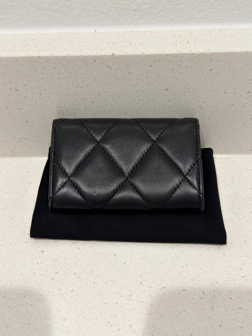 Black Quilted Leather Mini Wallet with Gold Logo
